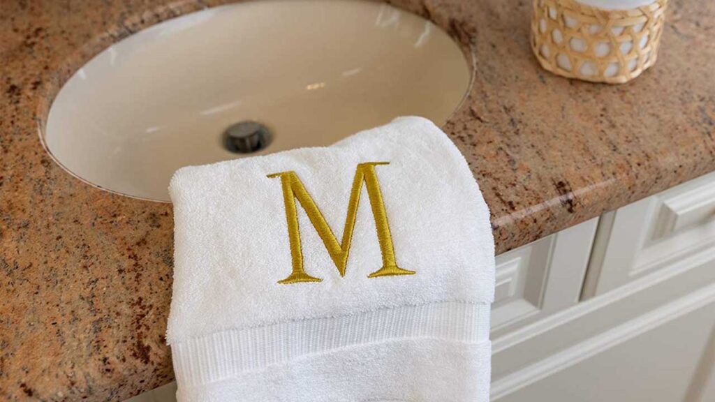 Towel With M Letter On It