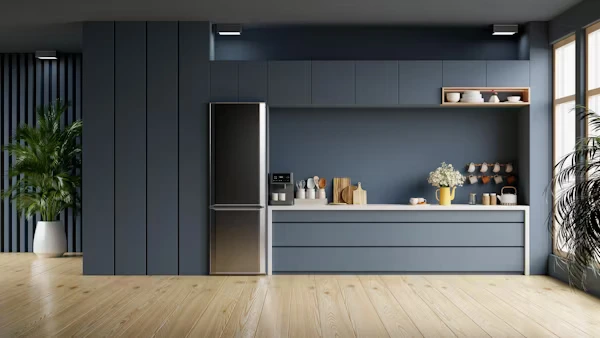 Bold moody kitchen cabinet colors in charcoal gray, navy blue, and forest green for 2025 kitchen remodels