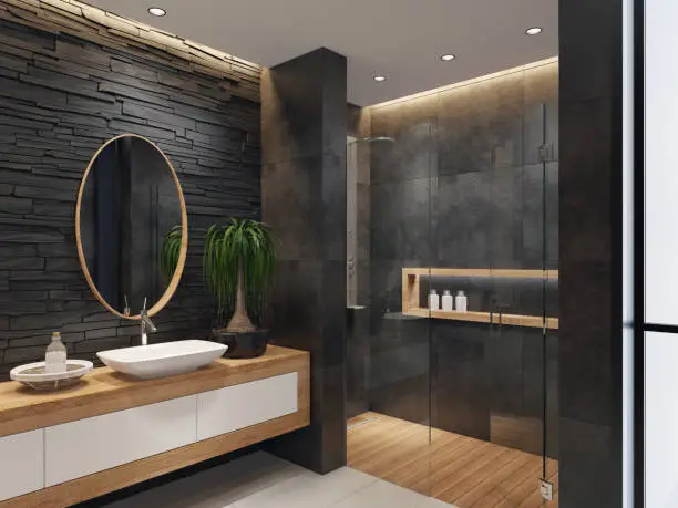 Minimalist walk-in shower design with frameless glass and tile wall