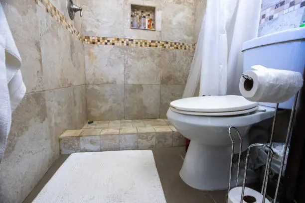 Example of poor-quality bathroom remodeling with uneven tiles