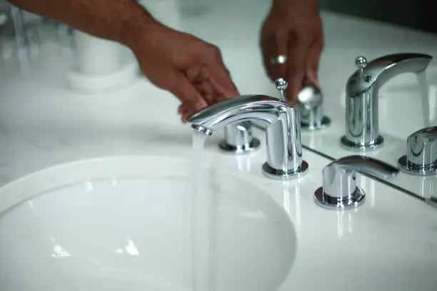 Various bathroom faucet styles in chrome, brass, and matte black