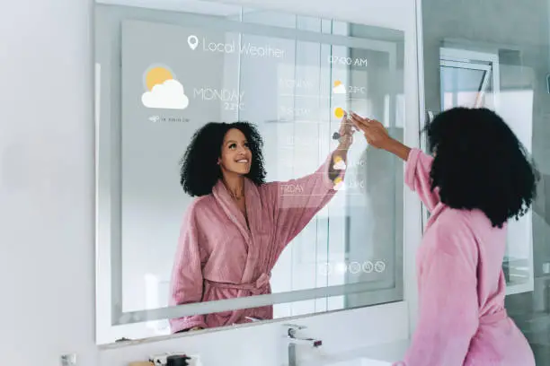Modern bathroom mirror with LED lighting, touch controls, and smart