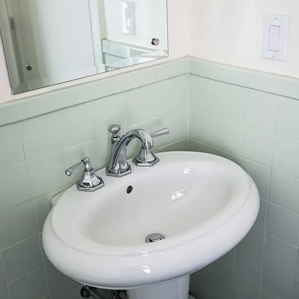 Affordable bathroom sink with chrome faucet