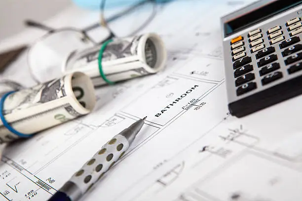 Budget worksheet and calculator used for planning a bathroom renovation