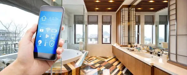 Smart bathroom remodel lighting system with app-based controls.