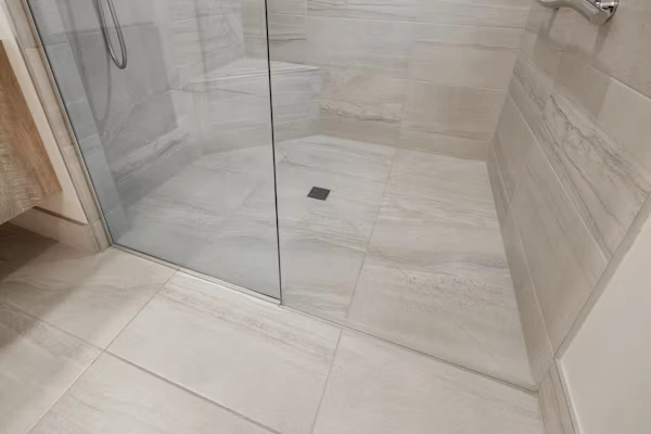 Premium tile materials for walk-in shower remodels by KBR Kitchen and Bath