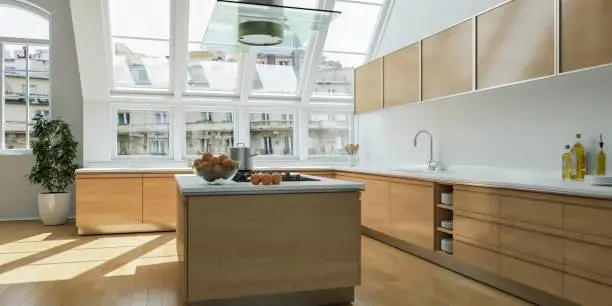 Modern kitchen remodeling design emphasizing daylight through large windows