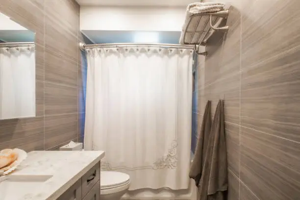 Bathroom remodel featuring fabric textures and noise-dampening surfaces