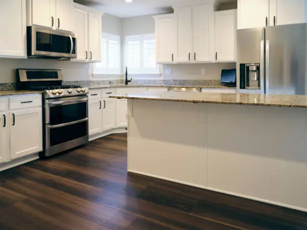 Kitchen remodel with wood-look vinyl flooring and stylish cabinetry
