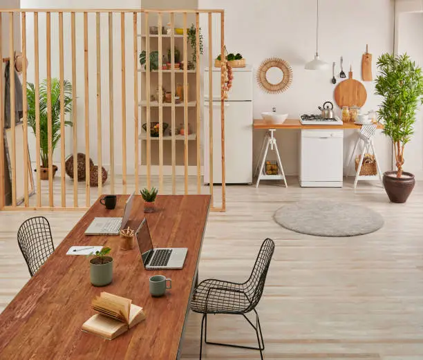 Open-plan kitchen with a built-in work nook showcasing kitchen and bathroom remodeling for remote work