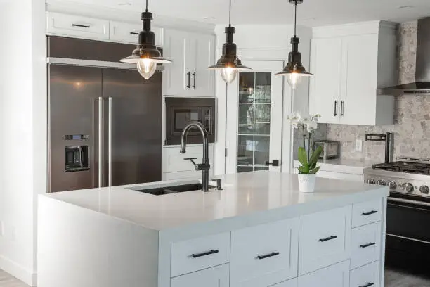 Beautiful modern kitchen remodel showcasing new cabinets and countertops