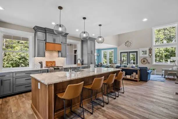 Seasonal living remodel with flexible kitchen and bathroom design concepts