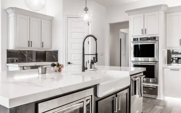 Fire-resistant and flood-ready kitchen remodel with durable cabinets and elevated appliances