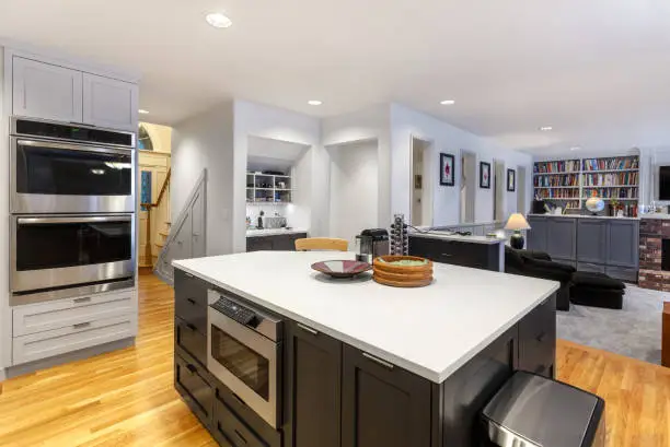 Open-concept kitchen remodeling with island seating for entertaining space