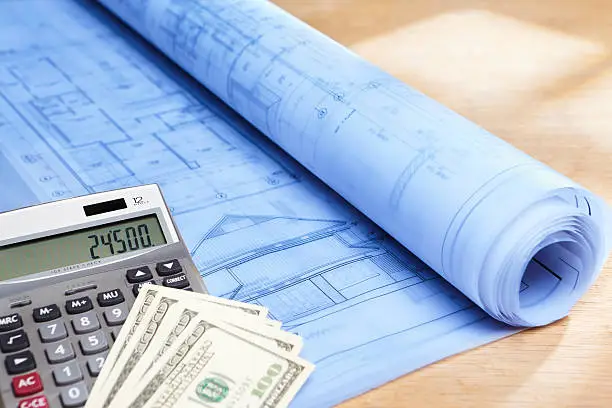 Budgeting spreadsheet and blueprint for remodeling a historic home