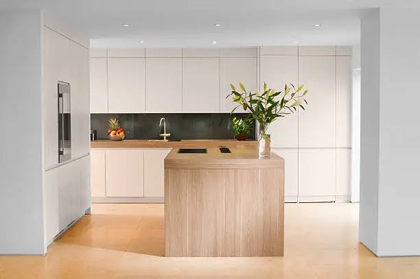 Modern kitchen and bathroom remodels with hidden storage and sleek cabinetry