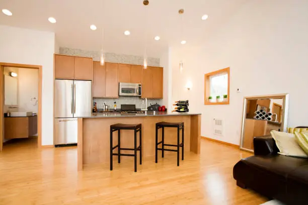 Eco-friendly bamboo flooring in a bright, remodeled kitchen space