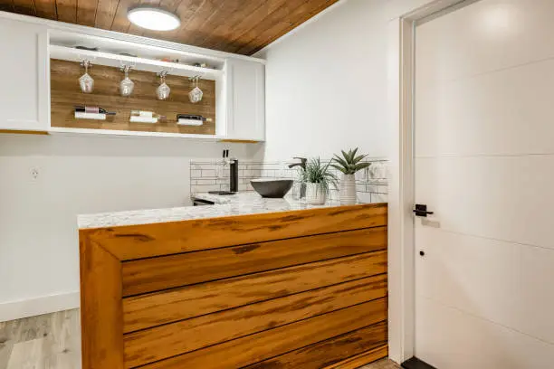 Eco-conscious kitchen and bathroom remodel featuring sustainable materials and energy-efficient fixture