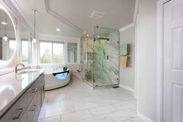 All-season bathroom remodel featuring heated flooring and cooling tile combos