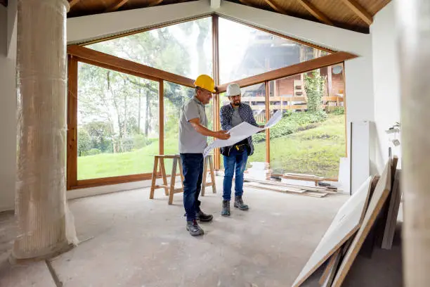 Modern home remodeling with green building materials and natural lighting