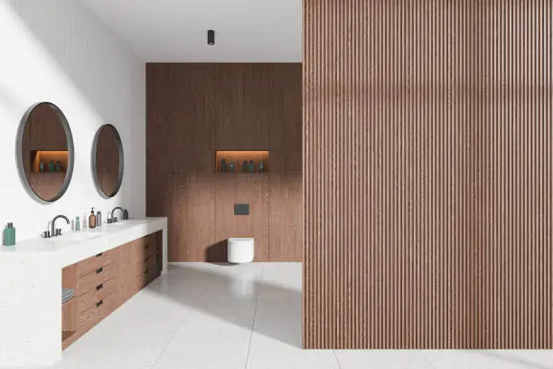 A modern bathroom with acoustic wall panels, sound-dampening flooring, and a quiet exhaust fan.