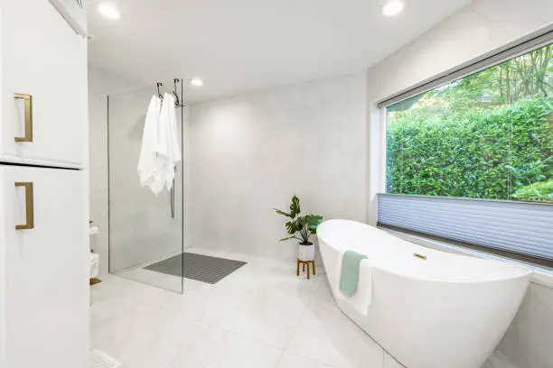 Sensory-balanced bathroom remodel featuring non-slip flooring and calming lighting.