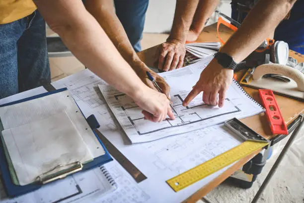 Kitchen remodel estimate being reviewed with kitchen remodeling company representative