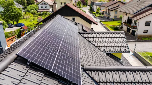 Eco-friendly remodeling in a modern sustainable home with solar panels and bamboo flooring