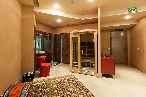 Infrared sauna and mood lighting as part of a luxury basement remodel
