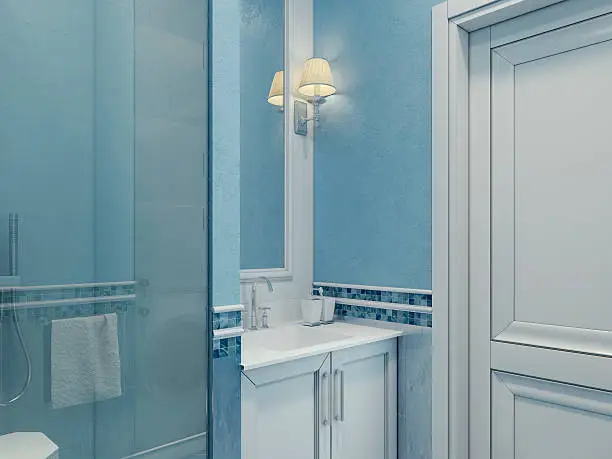 bright lighting and airy paint colors for small bathrooms