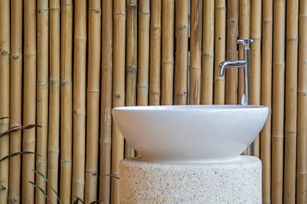 Eco-friendly home remodeling with water-efficient bathroom fixtures and bamboo elements
