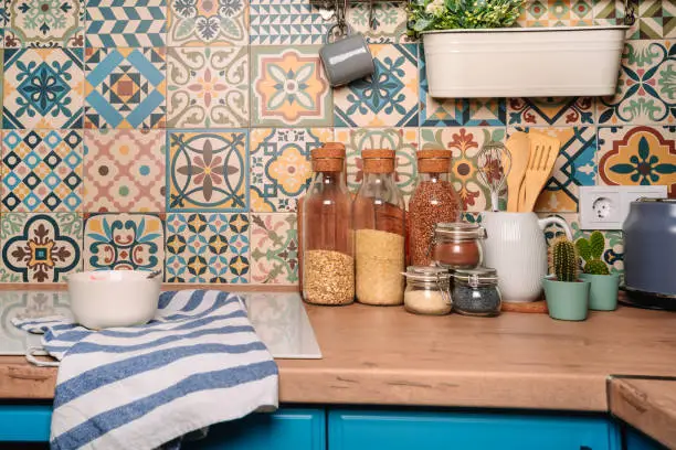 Mediterranean kitchen with mosaic backsplash, crafted by KBR Kitchen & Bath’s best kitchen remodelers near me.