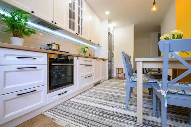 Affordable kitchen with acoustic rugs, crafted by KBR’s remodel contractors for soundproofed kitchen and bathroom remodels.