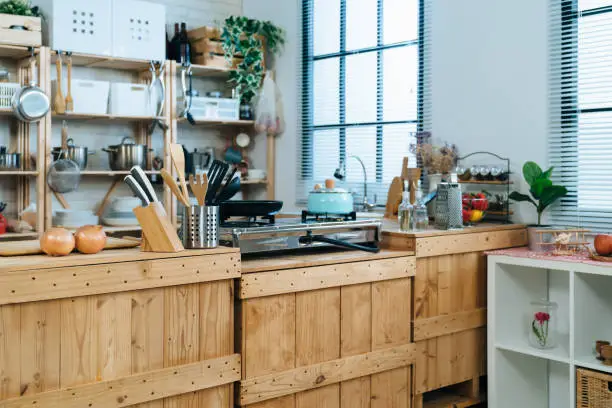 Kitchen with reclaimed wood cabinets, crafted by KBR’s bathroom and kitchen remodel contractors for zero-waste design.