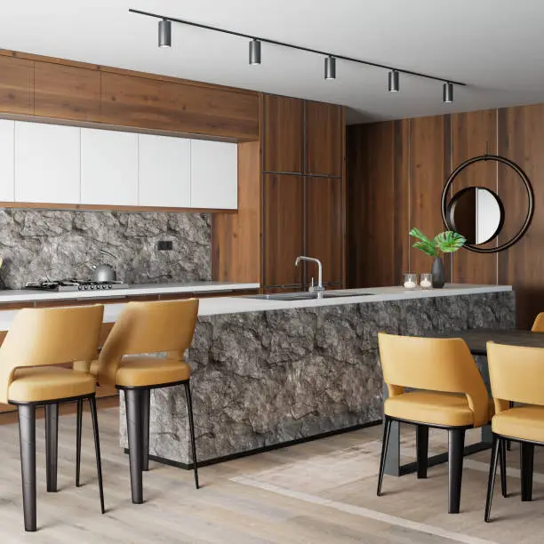 Kitchen with natural stone countertops, highlighting KBR’s travel-inspired kitchen and bathroom design.
