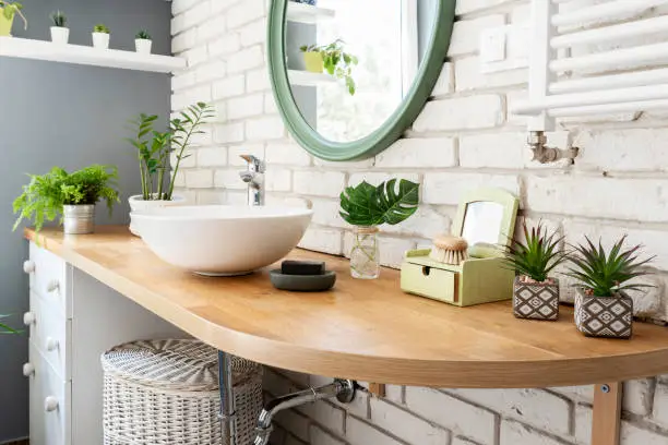 Zero-waste bathroom with low-flow fixtures, highlighting KBR’s sustainable kitchen and bathroom remodeling.