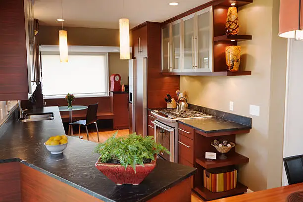 Small kitchen remodel for chefs with space-saving solutions by KBR in Manassas showrooms.