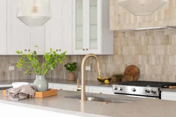 Modern kitchen with adjustable countertops and lever handles, showcasing KBR’s universal design in kitchen and bathroom remodeling for accessibility.