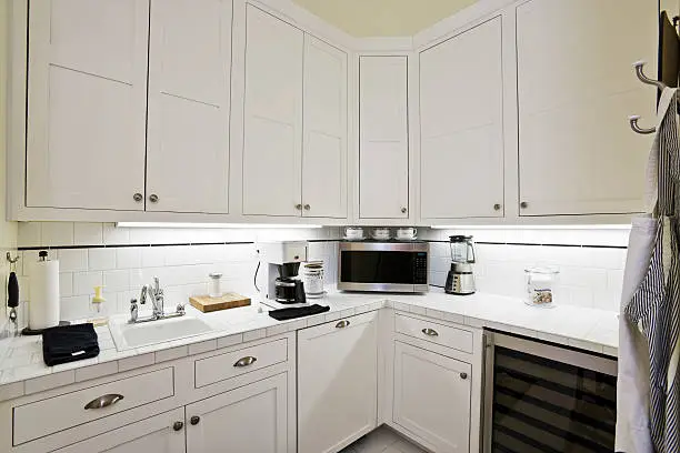 Kitchen remodel contractors design coffee stations for daily efficiency in a small kitchen remodel by KBR.
