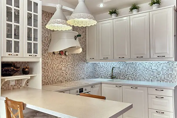 Travel-inspired kitchen with mosaic tiles, showcasing KBR Kitchen & Bath’s kitchen and bathroom remodel expertise.