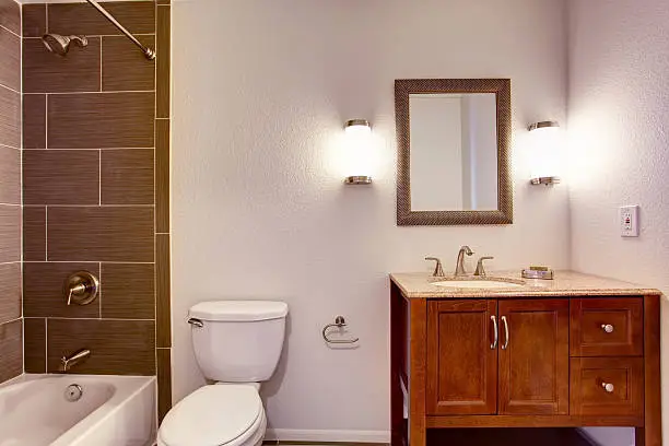 Clutter-free small bathroom remodel for wellness by KBR’s bathroom remodel company in Fairfax.