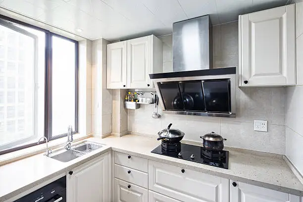 Fire-resistant kitchen with smart ventilation, showcasing KBR Kitchen & Bath’s small kitchen remodel expertise.