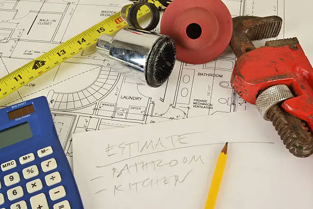 Bathroom remodeling companies plan soundproofing with clients for a kitchen remodel estimate at KBR’s Manassas showroom.