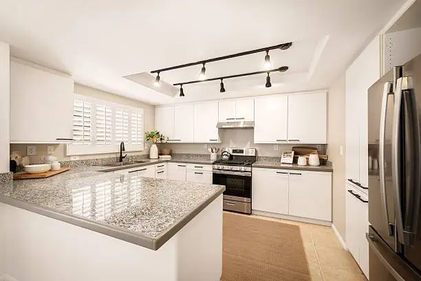 Kitchen with ENERGY STAR appliances and solar battery storage.