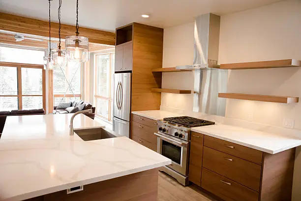 Mountain home kitchen with quartz counters and high-altitude appliances, showcasing KBR’s design.