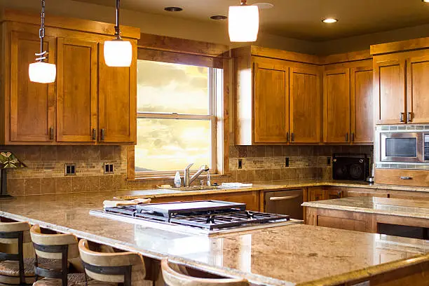 Kitchen with granite counters and UV-resistant cabinets, built for mountain durability.