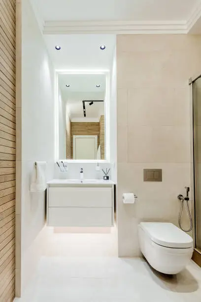 Small bathroom with streamlined layout and proper lighting