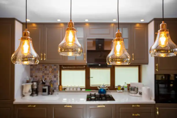 Kitchen with pendant lights and under-cabinet LEDs
