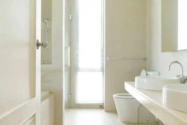 Bathroom with natural light and soft color tones for sensory appeal.