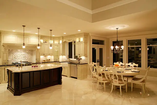 Kitchen and bathroom with matching countertops and lighting